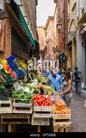 Produce stalls on Via Pescherie Vecchie in the historic city centre, Bologna, Emilia Romagna, Italy Stock Photo
