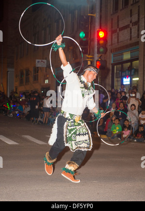 Native American with traditional costume participates at the annual Inter-tribal ceremonial night parade Stock Photo