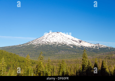 Mount Bachelor near Bend, Oregon in the early summer with a lot of snow still on the top Stock Photo