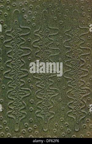 green leathercraft tooled vintage book cover with texture and grain Stock Photo