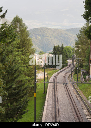 Aigle Leysin railway in the Vaud canton of Switzerland, view of steep section of tracks , Rhone valley behind Stock Photo