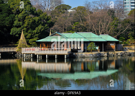 Traditional tea house on the water in Tokyo City Park Stock Photo