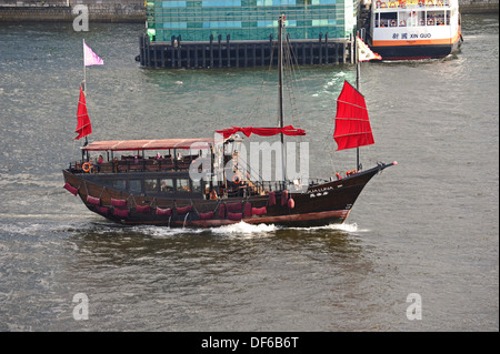 The Aqualuna, a converted Chinese river barge carrying tourists on a tour of Hong Kong Harbour. Stock Photo