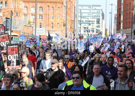 Manchester, UK. 29 Sept 2013. Thousands of people have taken part in a demonstration organised by the Trades Union Congress (TUC) in Manchester on Sunday, September 29, 2013. Demonstrators, many with placards and banners marched through Manchester city centre where the Conservative party conference is taking place this week. Demonstrators are protesting about possibly privitisation and cuts to the National Health Service (NHS) as well as cuts to other public services. Credit:  Christopher Middleton/Alamy Live News Stock Photo