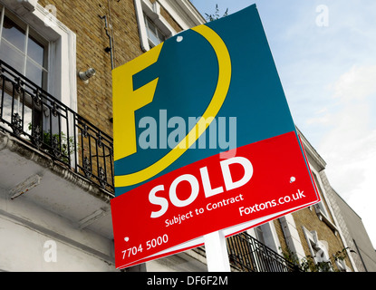 Foxtons sold sign outside London property Stock Photo