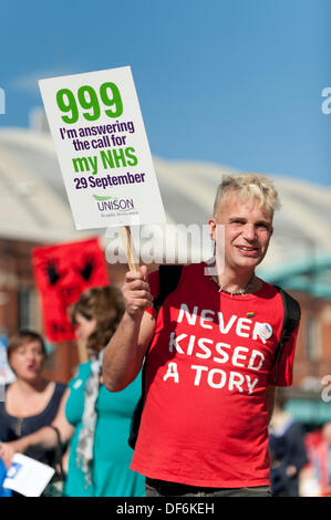 Manchester, UK. 29th Sept 2013. A male protester wearing a 'Never Kissed a Tory' t-shirt during a North West TUC organised march and rally intending to defend National Health Service (NHS) jobs and services from cuts and privatisation. The march coincides with the Conservative Party Conference 2013 being held in the city. Credit:  Russell Hart/Alamy Live News.
