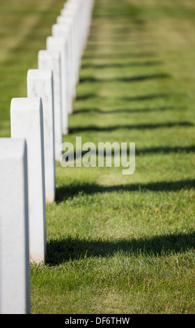 Grave markers casting shadows, Black Hills National Cemetery Stock Photo