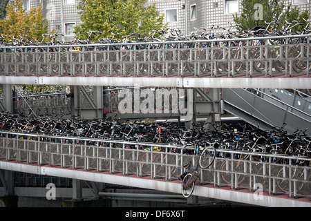 Bicycle parking garage or Fietsflat at the Central Station in Amsterdam. Stock Photo