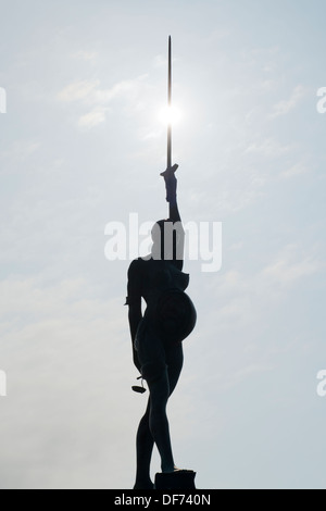 Damien Hirst's statue 'Verity' on the pier at Ilfracombe, North Devon, UK. Stock Photo