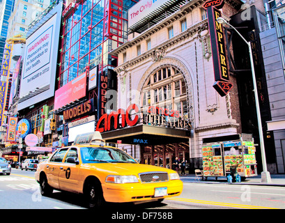 Times Square, famous tourist attraction featured with Broadway Theaters and famous restaurant and store locations in New York Ci Stock Photo