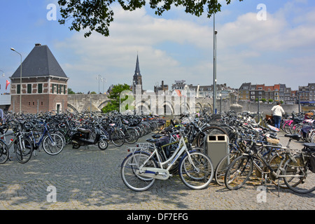 Maastricht City popularf full up cycle parking area beside River Meuse at  Saint Servatius (Sint Servaasbrug) bridgesummer Limburg Netherlands Europe Stock Photo