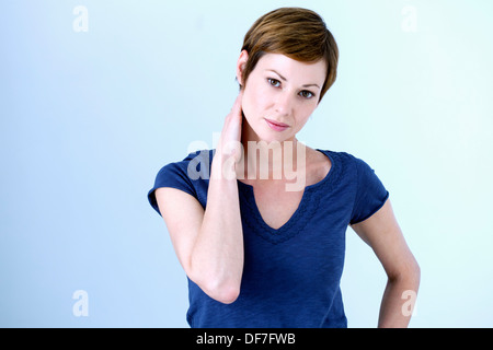 CERVICALGIA IN A WOMAN Stock Photo