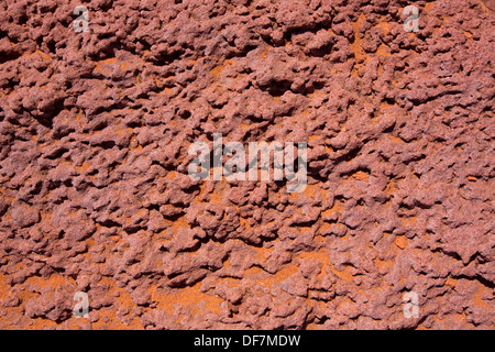 Arizona red stone detail with orange desert sand near Colorado River Stock Photo