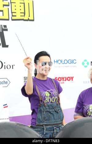 Actress Carina Lau attends public activity held by Hong Kong Anti-cancer Society in Hong Kong,China on Sunday Sep 29,2013. Stock Photo