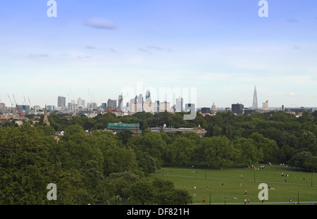 View of central London from Primrose Hill, including The Shard, St Paul's Cathedral, City of London and Canary Wharf. Stock Photo
