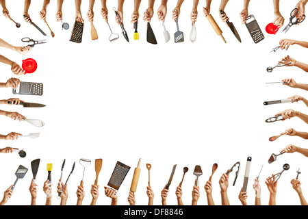 Frame with many hands holding different kitchen tools for gastronomy Stock Photo