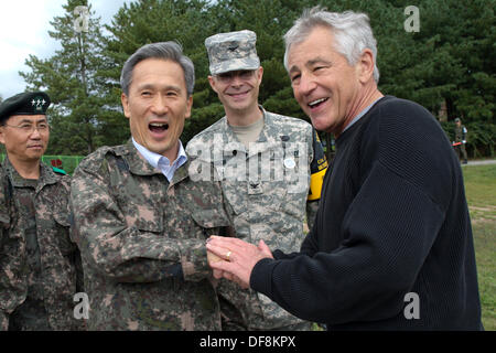 US Secretary of Defense Chuck Hagel greets Republic of Korea Minister of Defense Kim Kwan-jin September 30, 2013 in Seoul, Republic of Korea. Stock Photo