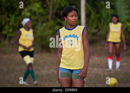 Black women play soccer at Rio Grande Quilombo in Alcântara, Maranhão, Northeast Brazil. Stock Photo