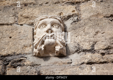 A stone face from The Great Wall of Walcot project, Walcot Street, Bath, England Stock Photo