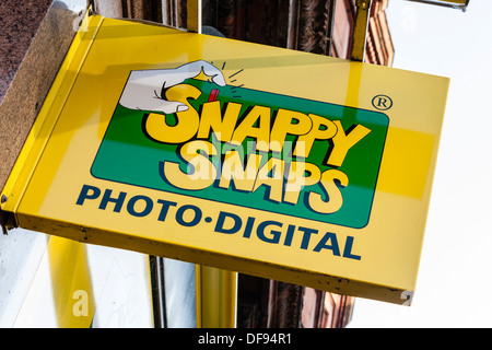 Snappy Snaps retailers sign above shop. Stock Photo