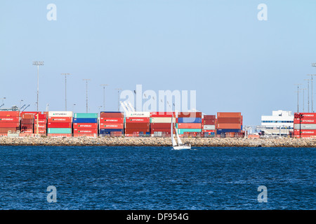 Containers and sailboat at the Port of Los Angeles California Stock Photo