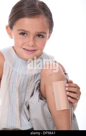 Girl with leg injured Stock Photo