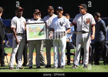 Former San Francisco Giants players Pablo Sandoval, left, and F.P.  Santangelo during a ceremony for longtime Giants clubhouse manager Mike  Murph Murphy being inducted into the team's Wall of Fame before a