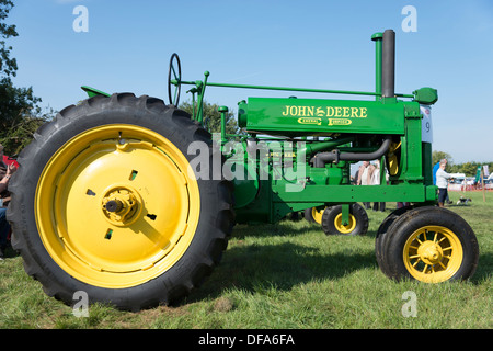 A vintage John Deere tractor on display at the Gransden Agricultural Show Cambridgeshire UK Stock Photo