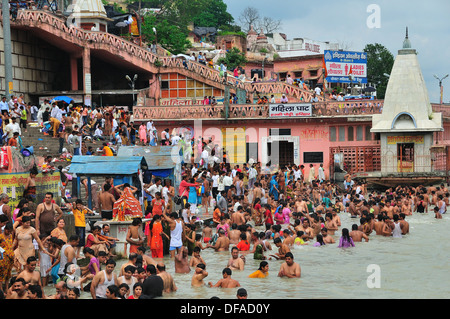 Pilgrims bathing at Har Ki Pairi ghat in the Ganges River 