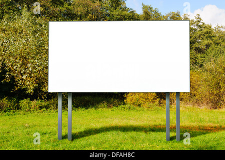 Billboard with empty screen standing in a field Stock Photo