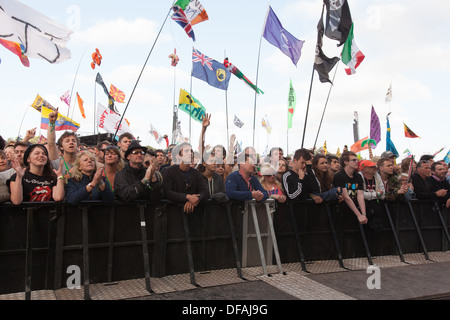 The crowd watching Primal Scream playing the Pyramid stage at the Glastonbury Festival 2013. Stock Photo