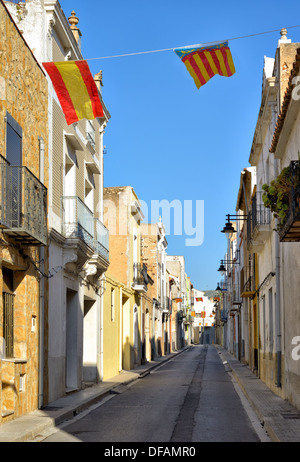 Traditional narrow street in historical center of Alcala de Xivert city in Valencia province, Spain Stock Photo
