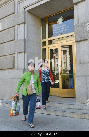 Washington, DC, USA. 1st Oct, 2013. Workers leave the National Museum of Natural History on the first day of a federal government shutdown caused by an impasse on Capitol Hill. Credit:  Jay Mallin/ZUMAPRESS.com/Alamy Live News Stock Photo