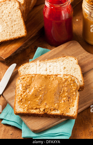 Homemade Chunky Peanut Butter Sandwich on Whole Wheat Bread Stock Photo