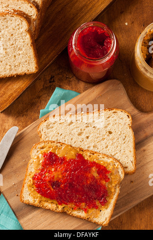 Homemade Peanut Butter and Jelly Sandwich on Whole Wheat Stock Photo
