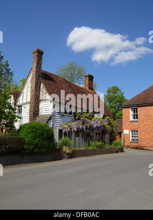 Wisteria covered traditional Kentish clapboard cottage in Smarden Village Kent UK Stock Photo