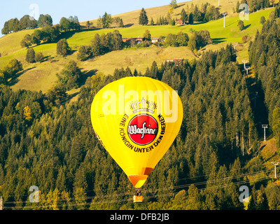 Austria kitzbuhel Europe hot air balloon advertising Warsteiner Pilsener beer German Stock Photo