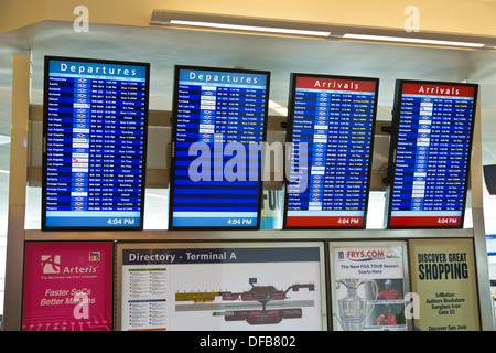 Airline departures and arrivals monitors in Terminal A Norman Y. Mineta San Jose International Airport, California, USA Stock Photo