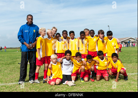 Junior football players with coach, team photo, Cape Town, South Africa Stock Photo