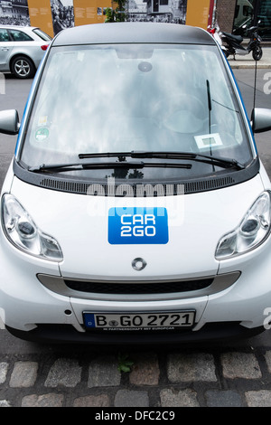 Car2Go car sharing SMART car parked on street in Berlin Germany Stock Photo
