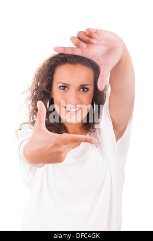 Beautiful woman making frame with her hands isolated Stock Photo