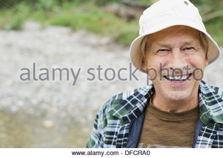 Close-up of senior man smiling outdoors
