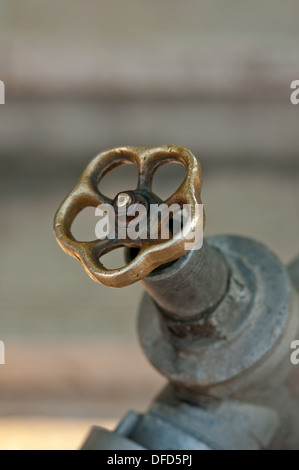 Close up detail of old water valve, shallow depth of field. Stock Photo