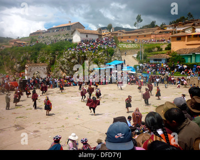 Traditional dancing in the main square of Chinchero, Cusco, Peru Stock Photo