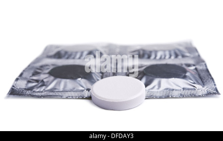 single white tablet with pack on white background Stock Photo