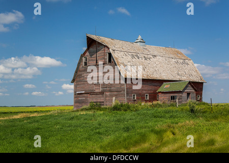 An old barn on a prairie field near Langdon, North Dakota, USA. Stock Photo