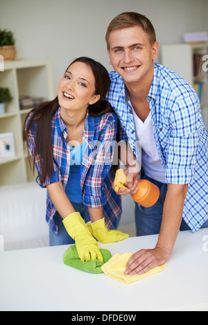 happy woman cleaning table at home kitchen Stock Photo - Alamy