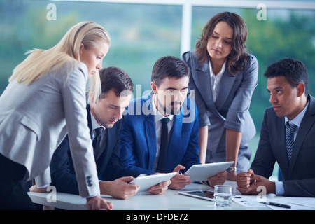 Elegant business partners planning work at meeting Stock Photo