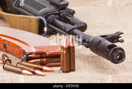 background with the cartridges and the AK47 Stock Photo