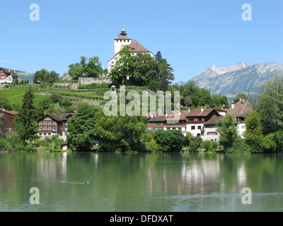 Werdenberg, the oldest timber framed settlement in Switzerland overlooked by the castle. Stock Photo